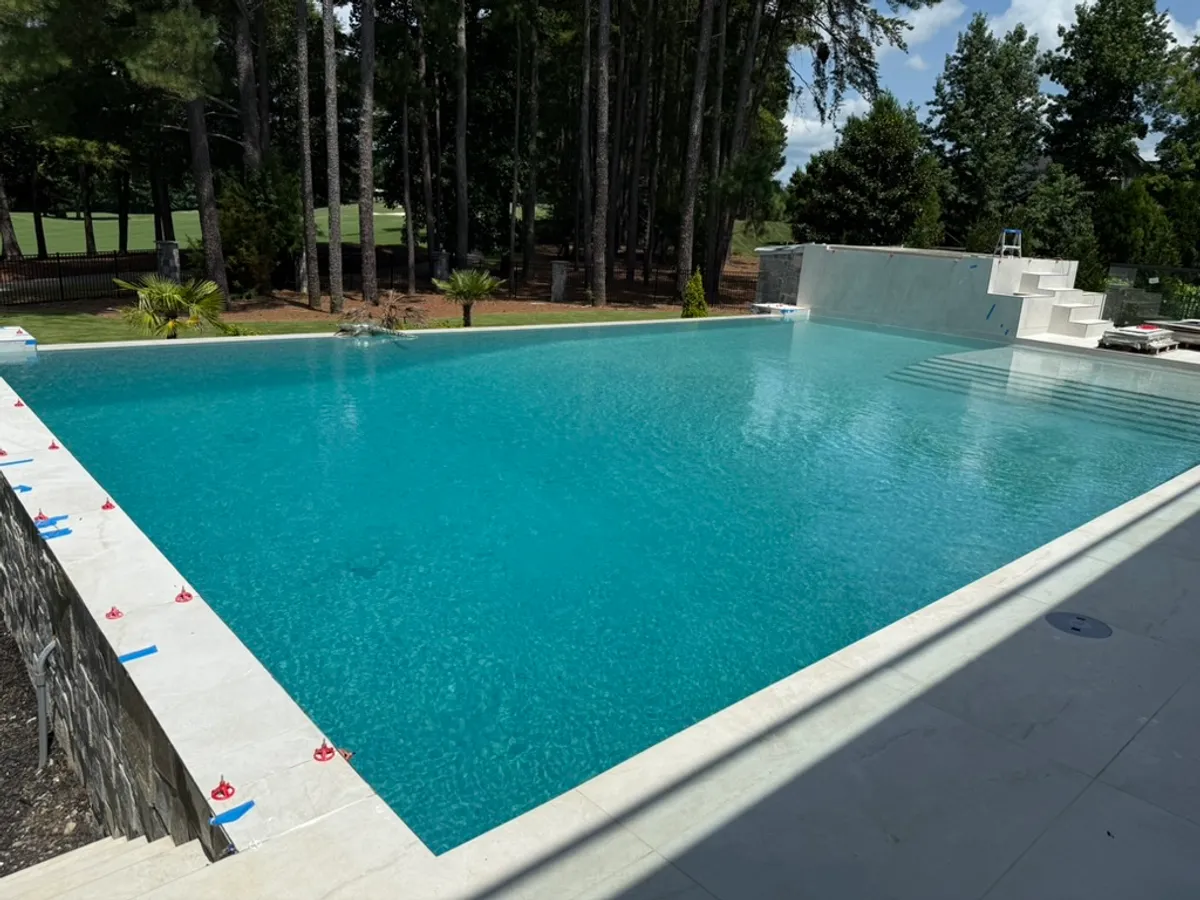 A residential pool serviced by The Pool Collective in Raleigh, NC