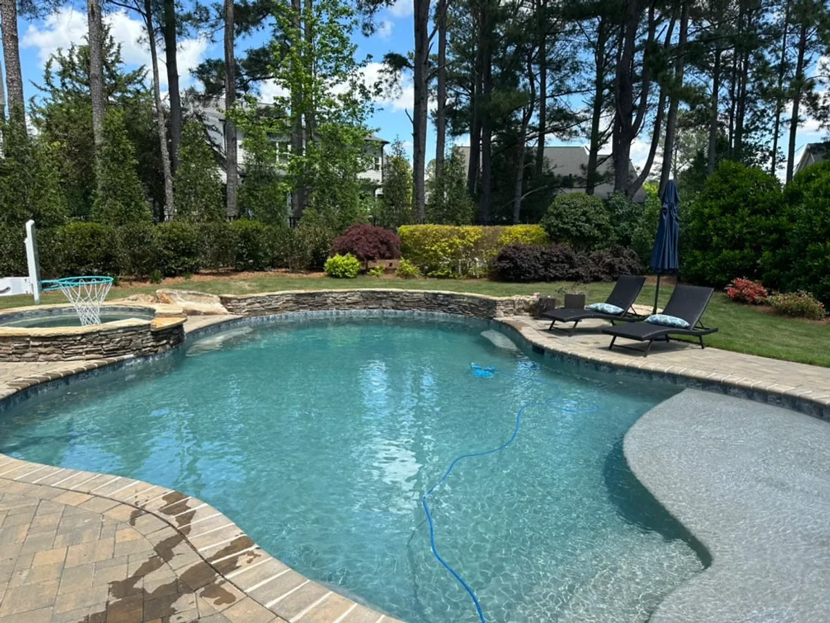 A residential pool serviced by The Pool Collective in Rolesville, NC