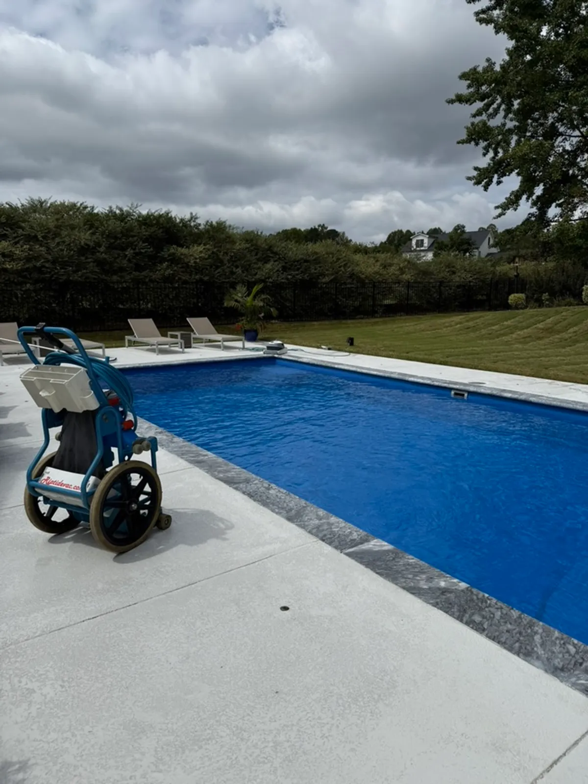 Professional pool cleaning equipment used by The Pool Collective's technicians